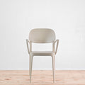 Front view of Alma Amy stacking chair in Sand