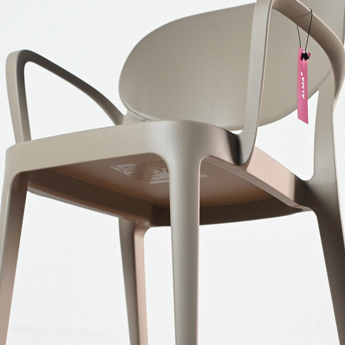 Close-up of the underside of Sand polypropylene seat and armrests