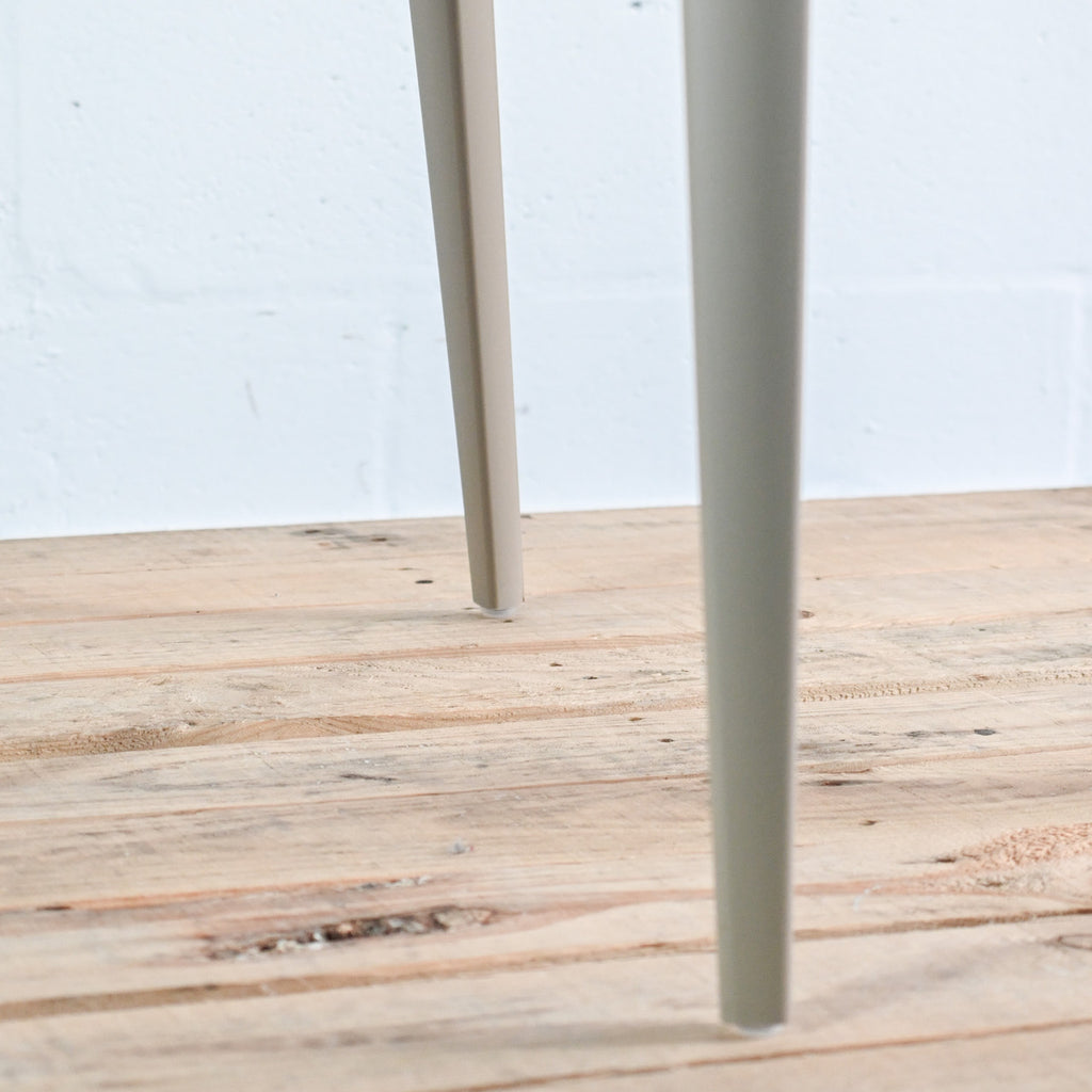 Close-up of Alma Amy chair leg and glide